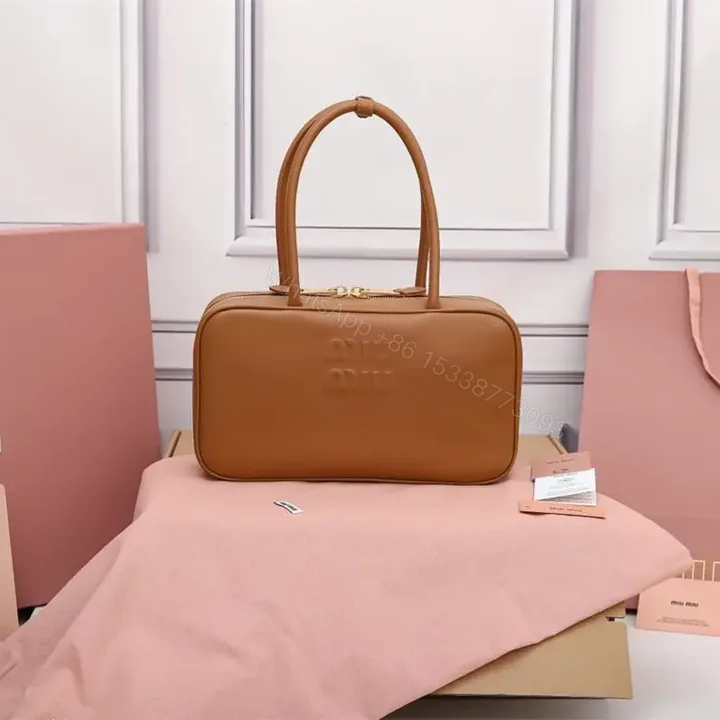 View 1 of 高仿miumiu*5BB172壓紋LOGO手提包小牛皮白蘭地免檢版
