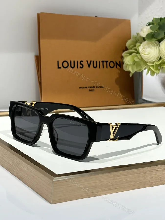 View 1 of Bold Black Sunglasses with Gold Emblem – Modern, Durable Acetate Frames