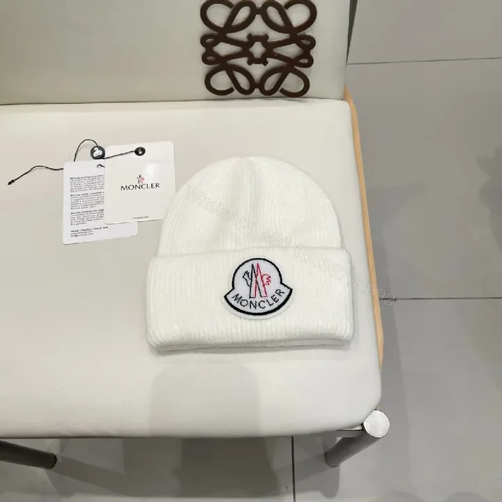 View 1 of White Knit Beanie: Ribbed Luxury, Crest Patch, All-Season