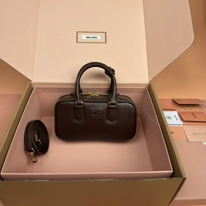 View 1 of 高仿miumiu*Arcadie系列5BP088小牛皮手袋石楠木色Mini免檢版