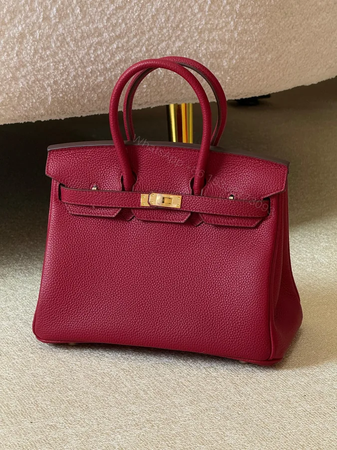 View 1 of Hermès Birkin bag in a Red Shade of Togo Leather