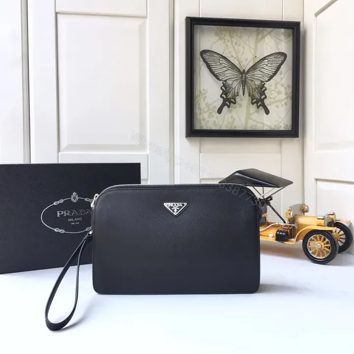 View 1 of Chic Black Saffiano Prada Clutch with Wrist Strap