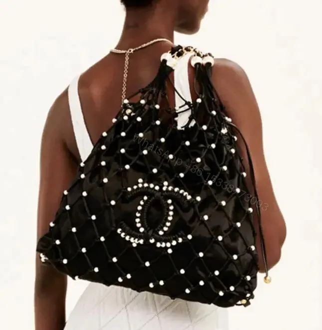 View 1 of CHANEL Nylon Pearl Coco Beach Net Tote