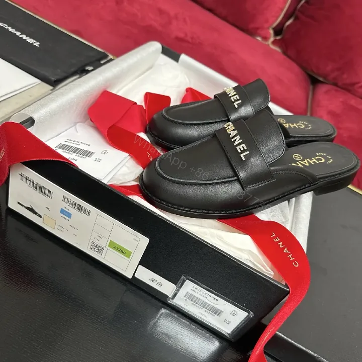 View 1 of Black Leather Slip-Ons with Gold Lettering Luxury Everyday Comfort