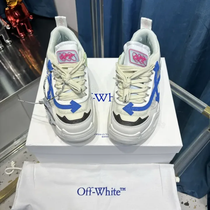 View 1 of Bold Streetwear Sneakers: Blue-Accent Textured Luxury High-Tops