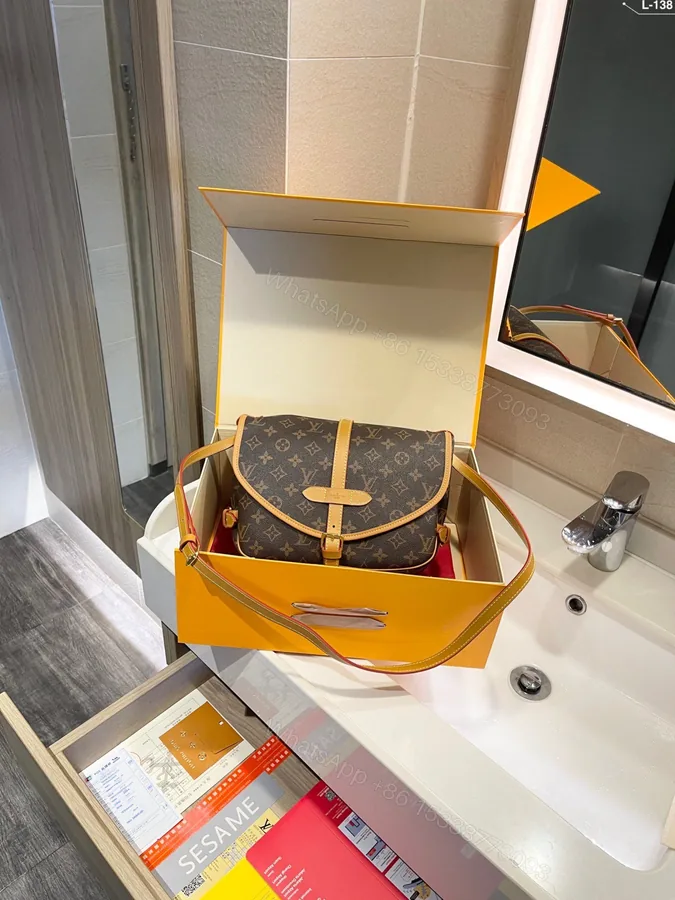 View 1 of Louis Vuitton Monogram Saumur 30