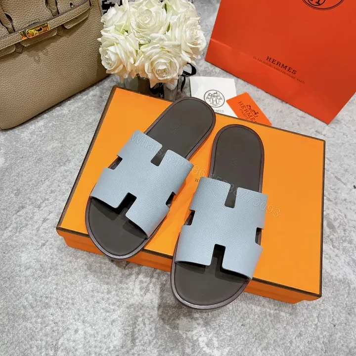 View 1 of Ice-Blue Hermes Oran Slides: Clean, Confident Comfort