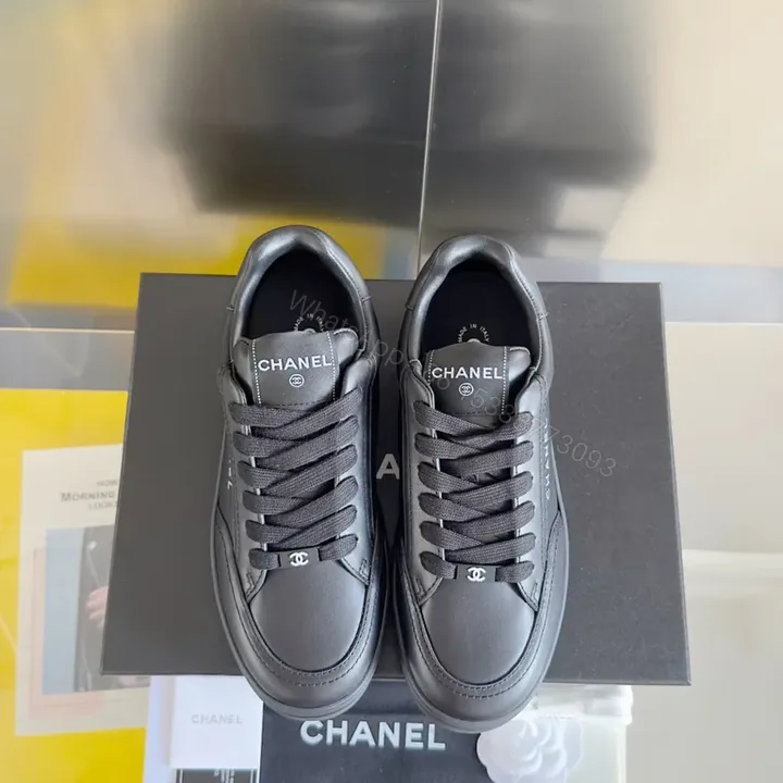 View 1 of Chanel-Inspired Black Leather Sneakers: Discreet Luxury Comfort