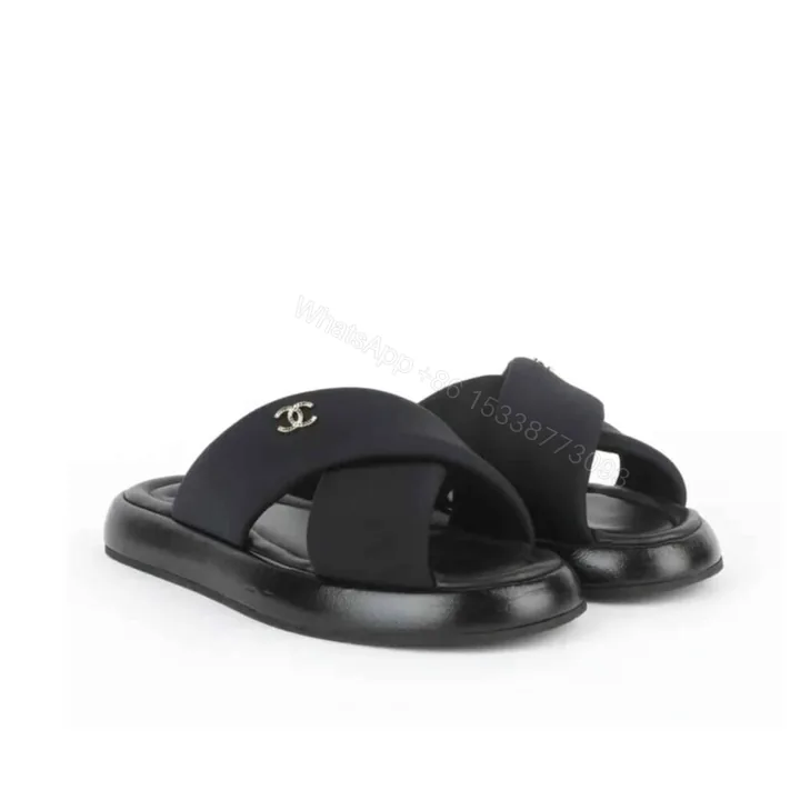 View 1 of Chanel CC Logo Criss Cross Slides Black