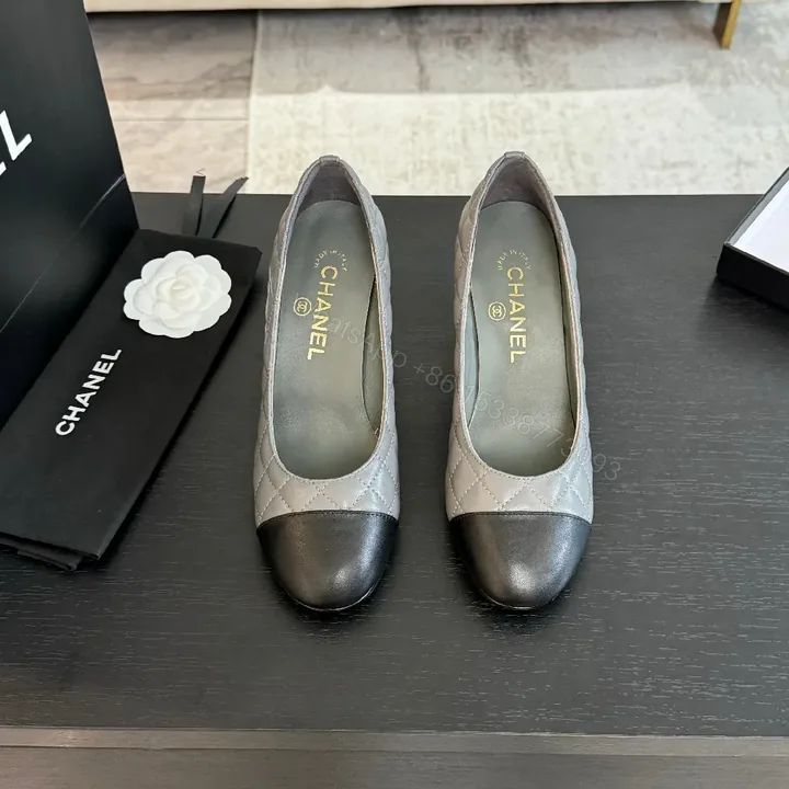 View 1 of Quilted Two-Tone Cap-Toe Pumps - All-Day Comfort