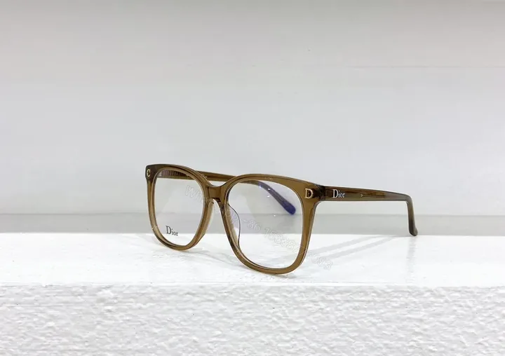 View 1 of Brown Translucent Dior-Brand Eyeglasses â€” Modern Everyday Luxury