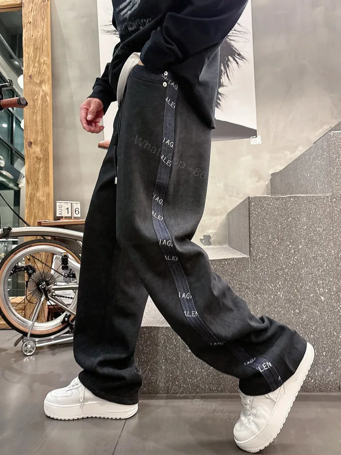 View 1 of Balenciaga一比一男士休閒長褲 黑色側邊織帶Logo寬鬆直筒運動褲