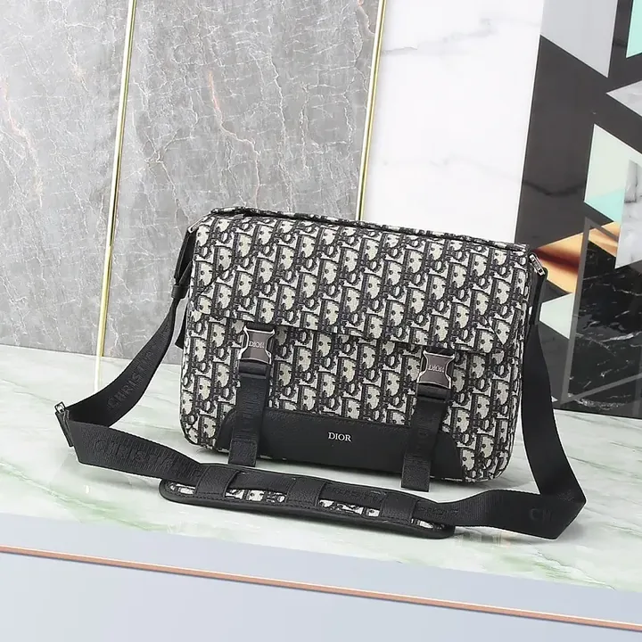 View 1 of Monogram Textured Messenger Bag: Modern Luxury Carryall