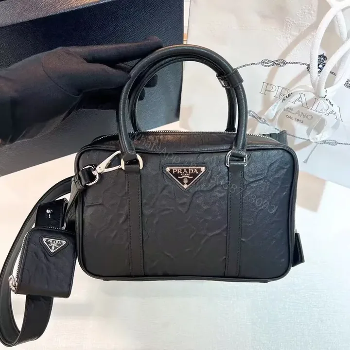 View 1 of Black Prada-Style Structured Top-Handle Bag, Compact Luxury