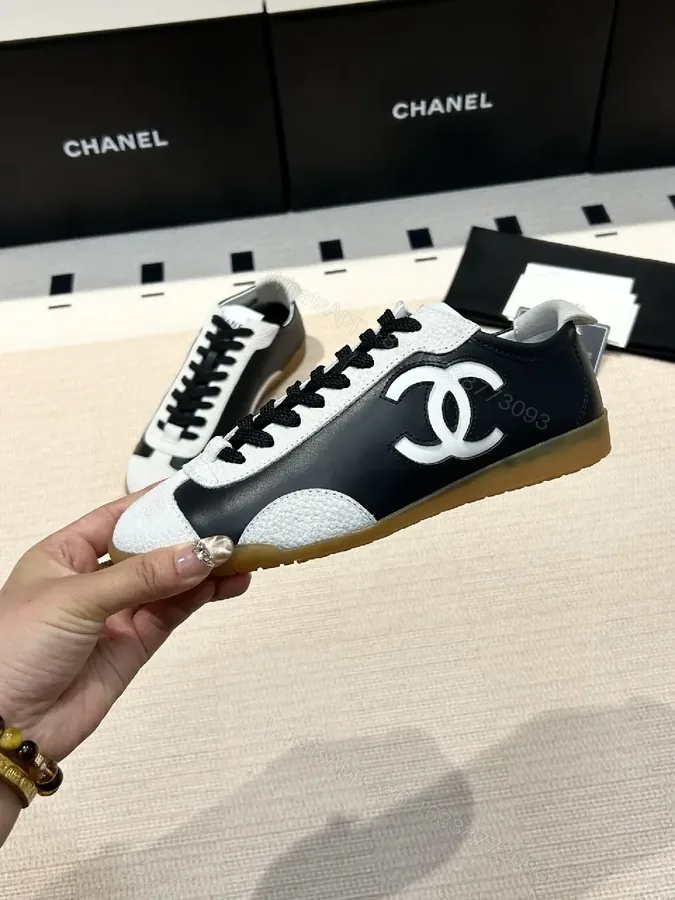 View 1 of Black Leather Techlo-Luxe Sneaker: Graphic Stripe, Cushioned Comfort