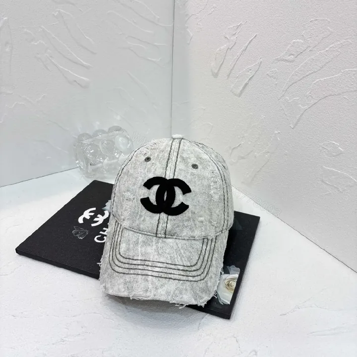 View 1 of Distressed Denim Logo Cap â€“ Tonal Chanel-Inspired Style