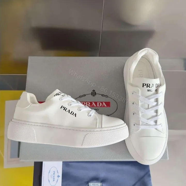 View 1 of PRADA MACRO RE-NYLON AND BRUSHED LEATHER SNEAKERS – PRD064