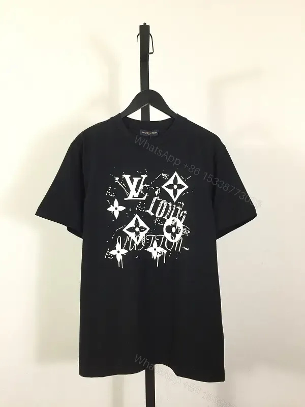 View 1 of Black Cotton Graphic Tee: Streetwear Luxe Statement Top
