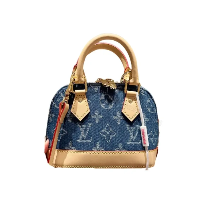 View 1 of Louis Vuitton Alma BB Monogram Canvas Bag Denim Blue 16Cm