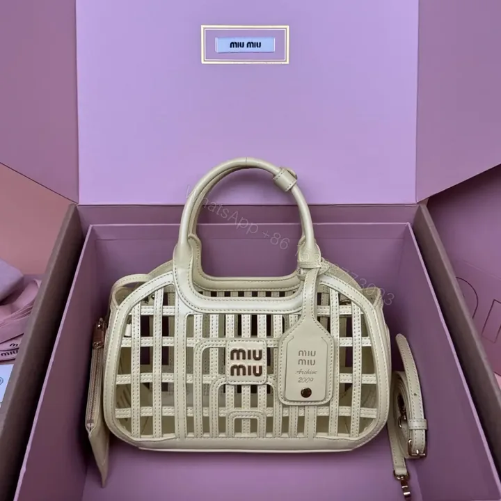View 1 of 高仿miumiu*5BA294小牛皮鏤空手提包黃色免檢版