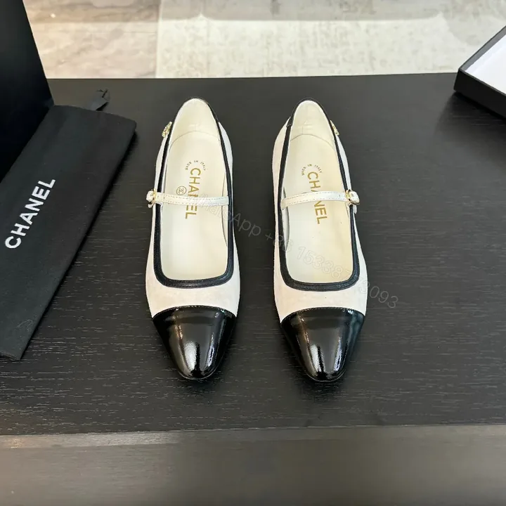 View 1 of Two-Tone Nude Suede Black Patent Mary Jane Pumps