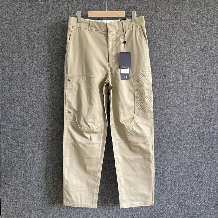 View 1 of Beige Cargo Pants with LV Monogram Patch