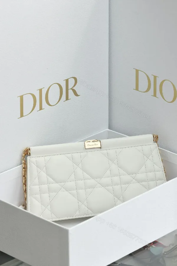 View 1 of Quilted White Leather Clutch: Subtle Luxe, Everyday Versatility