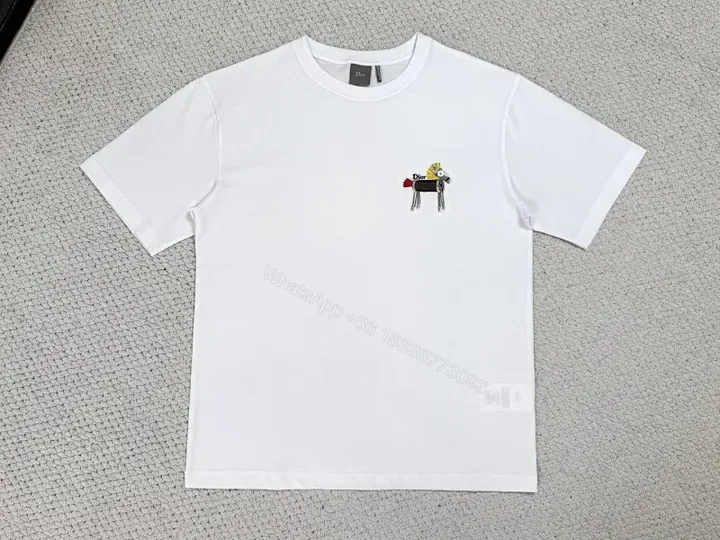 View 1 of White Cotton Tee with Tiny Dior Motif, Minimal Luxury, Everyday Essential