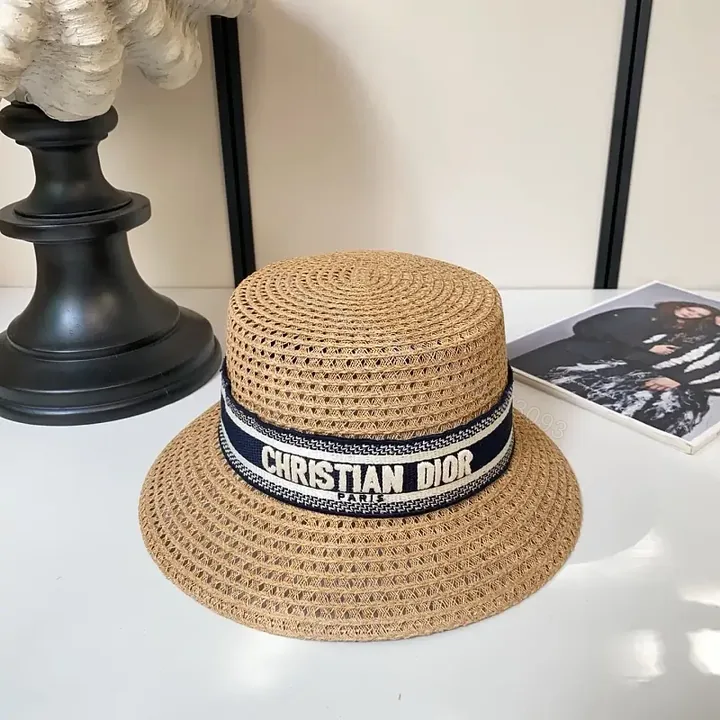 View 1 of Natural Fiber Straw Hat, Bucket Style, Tight Circular Weave, Navy Band