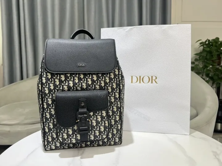 View 1 of Compact Monogram Backpack: Black Leather Trim, High-Cabinet Style, All-Day Comfort