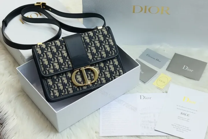 View 1 of Crossbody Bag: Monogram Pattern, Black Leather, Compact, Gold Clasp