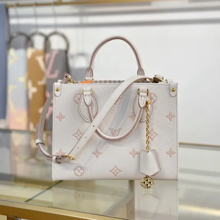 View 1 of Louis Vuitton OntheGo PM TH Tote Bag