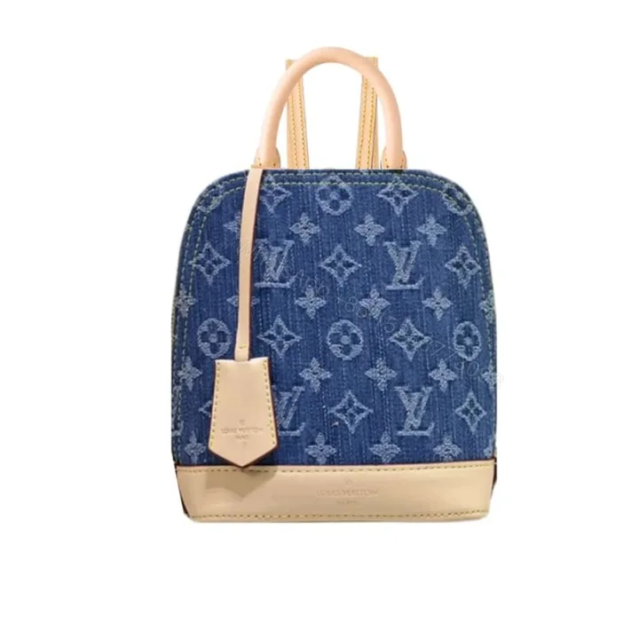 View 1 of Louis Vuitton Alma Backpack Blue Denim 20Cm
