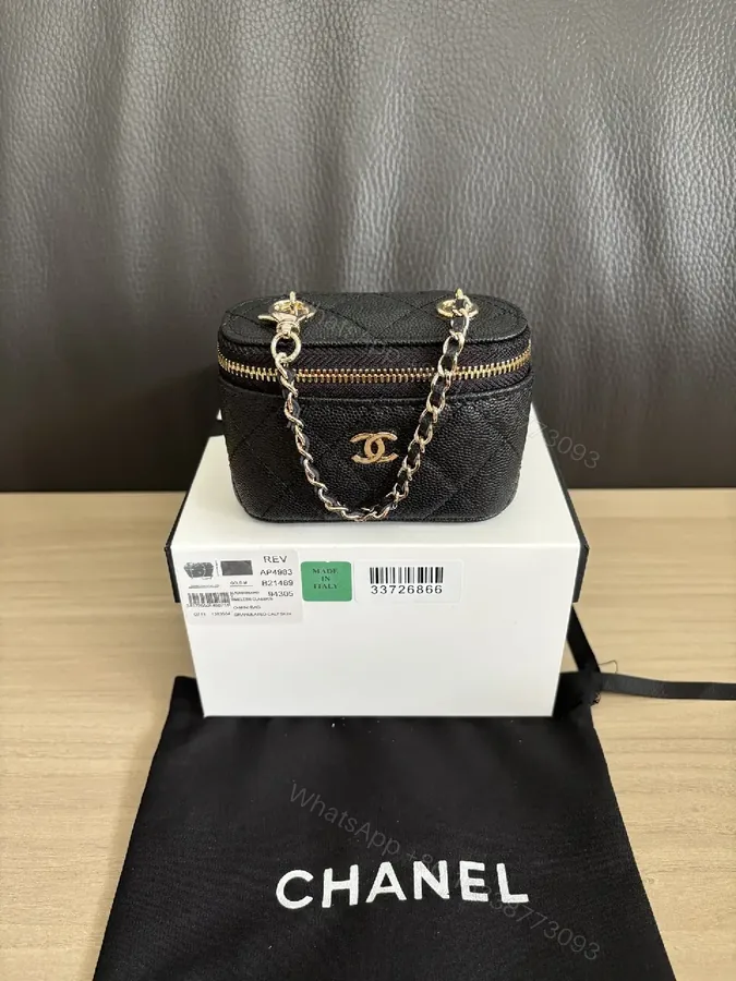 View 1 of Compact Quilted Chain-Linked Flap Bag: Luxe Mini Crossbody