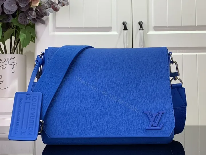 View 1 of Bold Blue Crossbody: Textured Leather, LV-inspired Monogram Bag