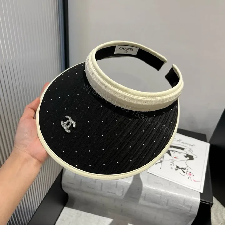 View 1 of Black Knit Dotted Visor with Cream Trim – Luxe Sun Shield