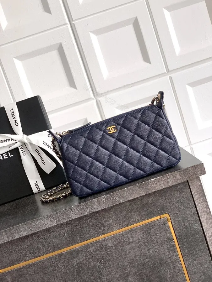 View 1 of Navy Quilted Crossbody: Gold-Emblem, Compact Luxury Bag