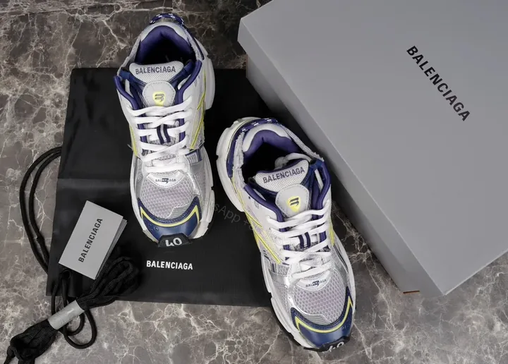 View 1 of Metallic High-Top Sneaker +Premium mixed-materials +Luxury Streetwear +Bold sculpted sole +Sneakers