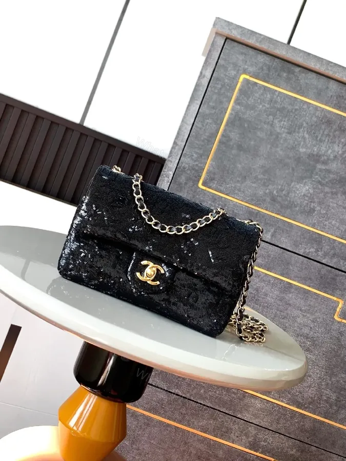 View 1 of Compact Black Sequin Handbag with Chain Strap