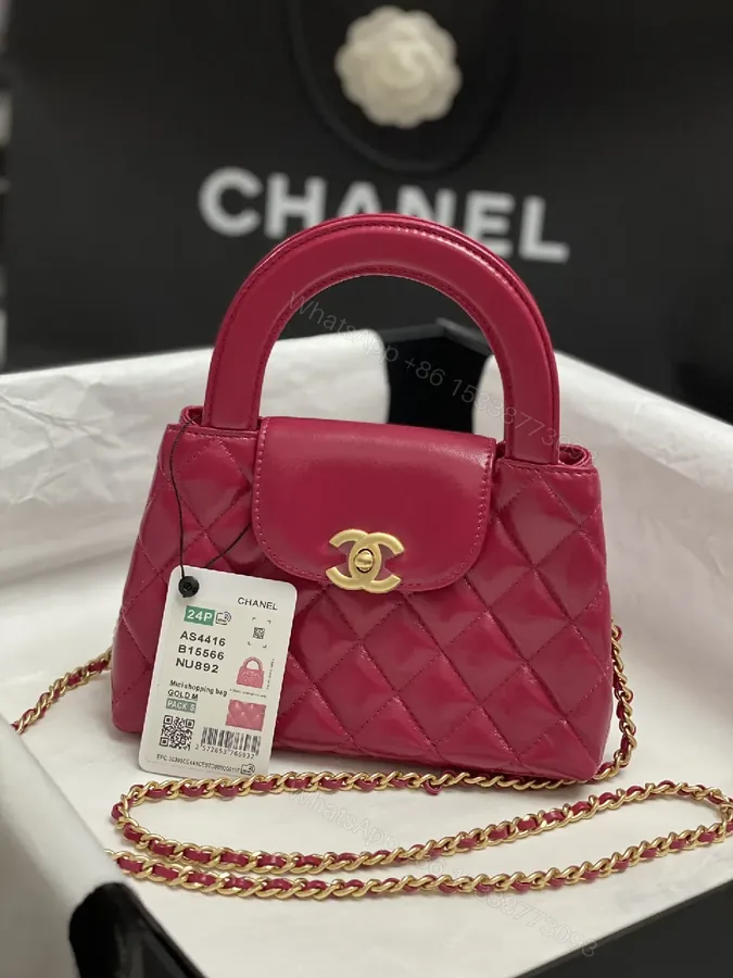 View 1 of Chic Fuchsia Quilted Mini Bag with Gold Hardware