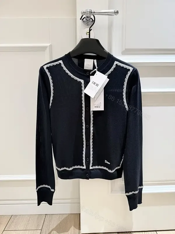 View 1 of Navy Knit Cardigan: White Piping, Modern Contrast, All-Day Comfort