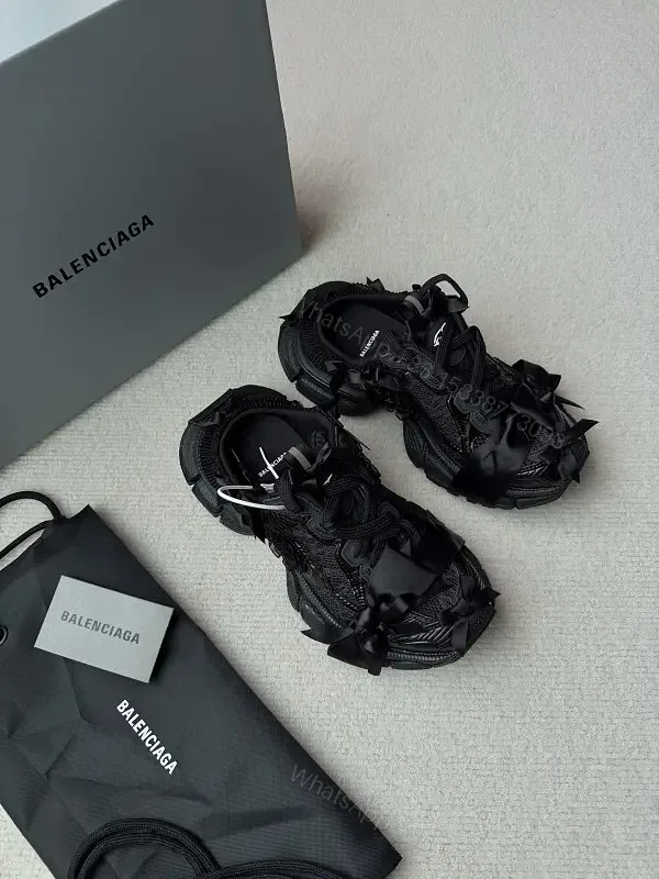 View 1 of Chunky Textured Luxury Sneakers with Satin Bow Accent