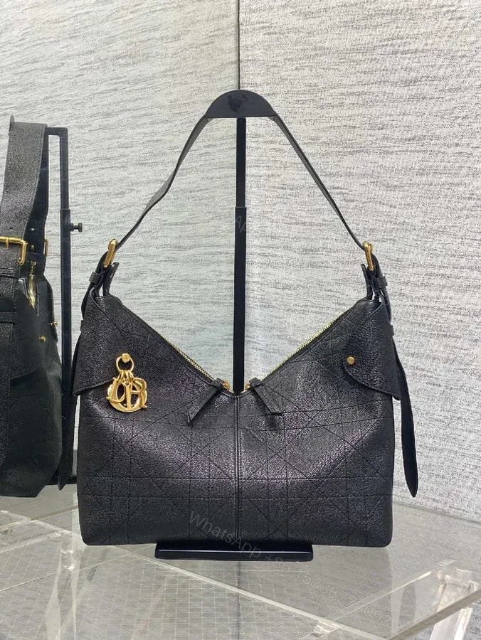 View 1 of Quilted Hobo Bag - Luxe Comfort, Gold Charm, Everyday Style