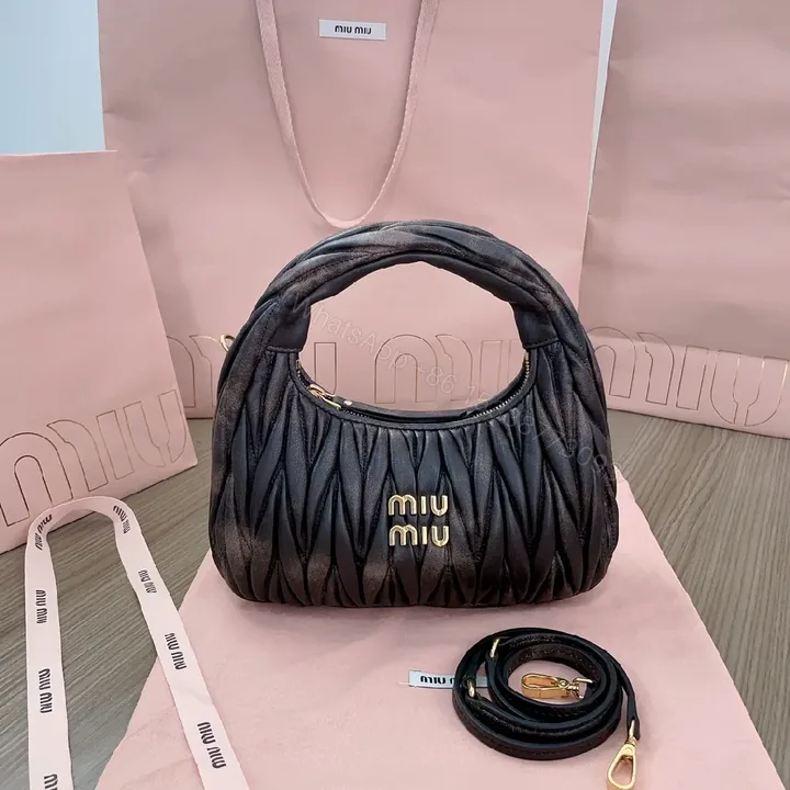 View 1 of Quilted Mini Bag: Gold Logo, Crossbody Charm