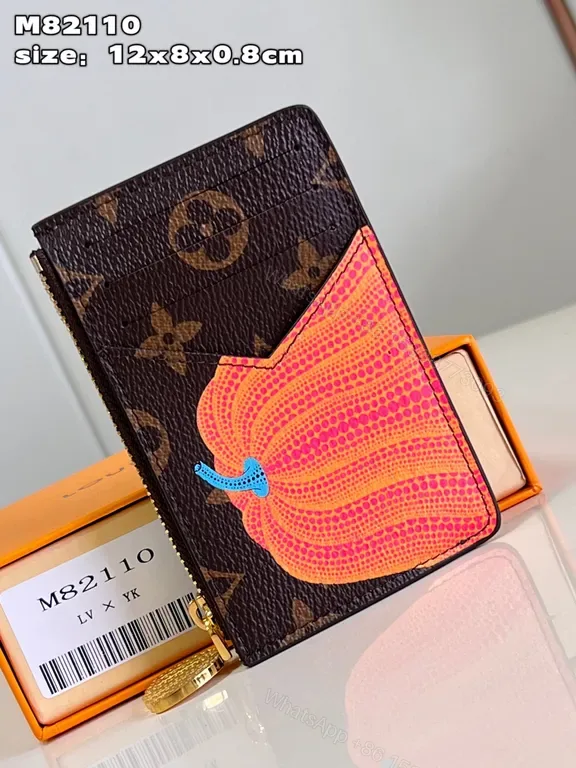 View 1 of Bold Monogram Wallet: Color-Pop Panel, Compact Luxury