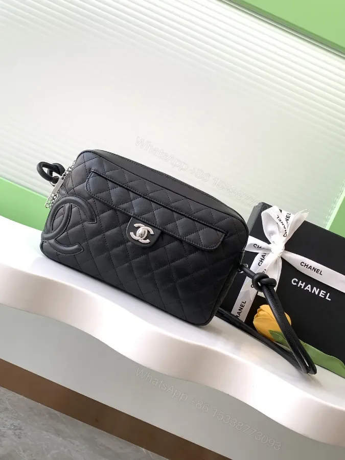 View 1 of Quilted PU Camera Bag: Chic, Silver Clasp, Crossbody