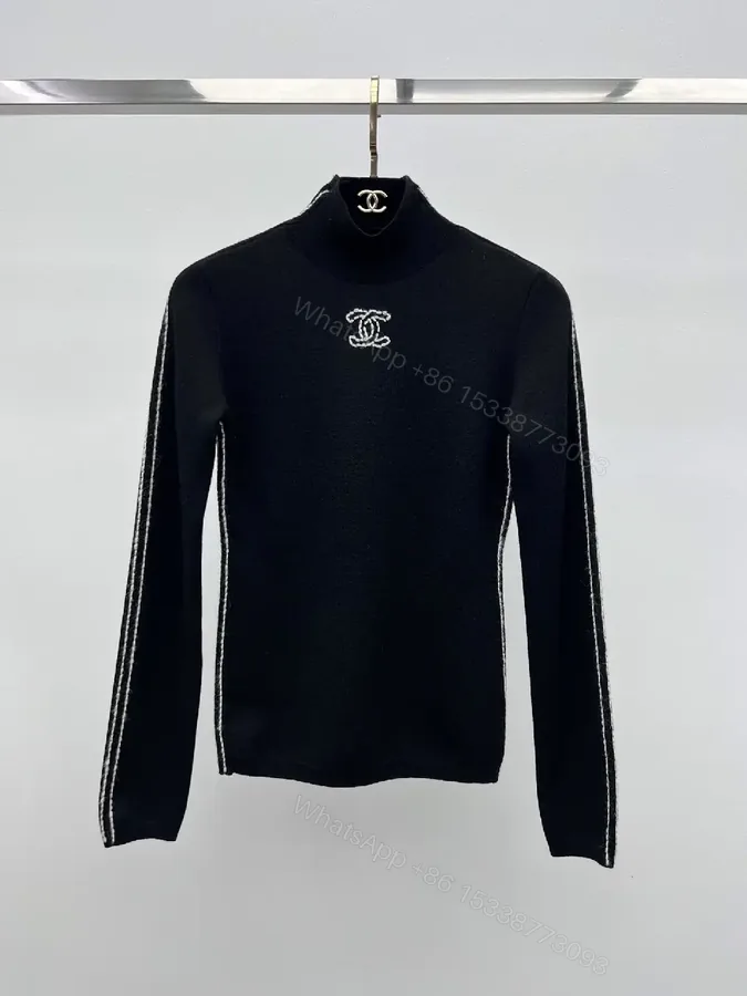 View 1 of Elegant Knit Turtleneck with Signature Embroidery, Black Knit Dishive