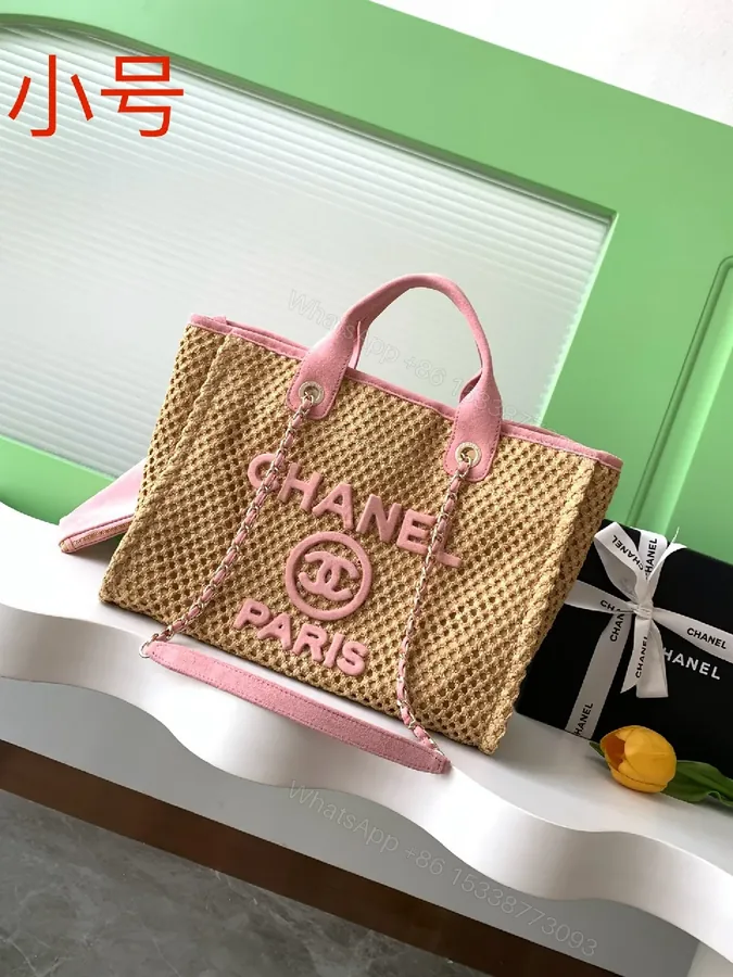 View 1 of Textured Straw Pink Tote with Chain Detail Bag