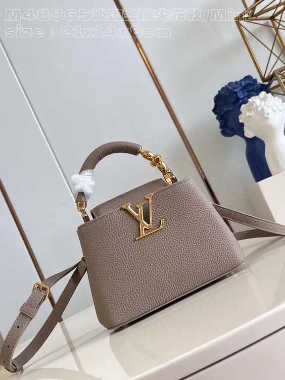 View 1 of Taupe Pebbled Leather Crossbody: Gold LV Accent, Compact Luxury Bag