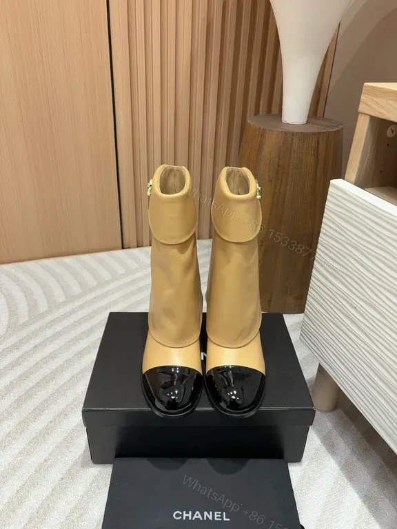 View 1 of Two-Tone Camel & Black Ankle Boots â€“ Modern Luxe Comfort